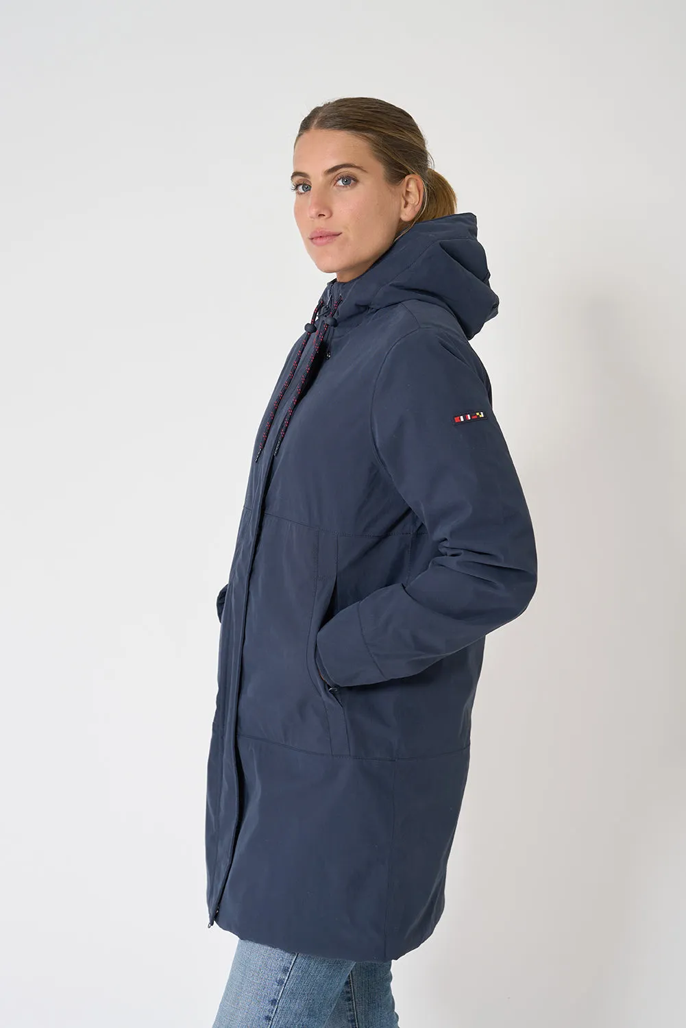 Abrigo de mujer impermeable con borreguito interior